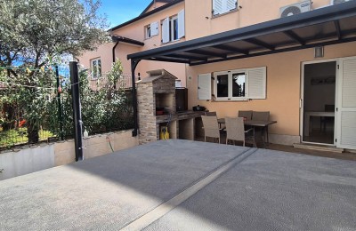 Casa a schiera di 103 m2 - con tre camere da letto e un giardino paesaggistico