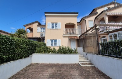 Casa a schiera di 103 m2 - con tre camere da letto e un giardino paesaggistico