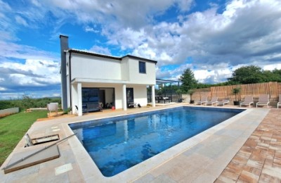 Modern and spacious detached villa with open sea views